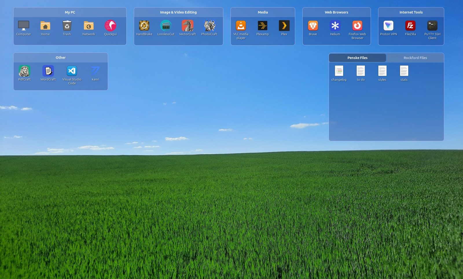 The same desktop with the icons grouped into named see-through cubbies: My PC, Image & Video Editing, Media, Web Browsers, Internet Tools, Other, and a tabbed cubby for files